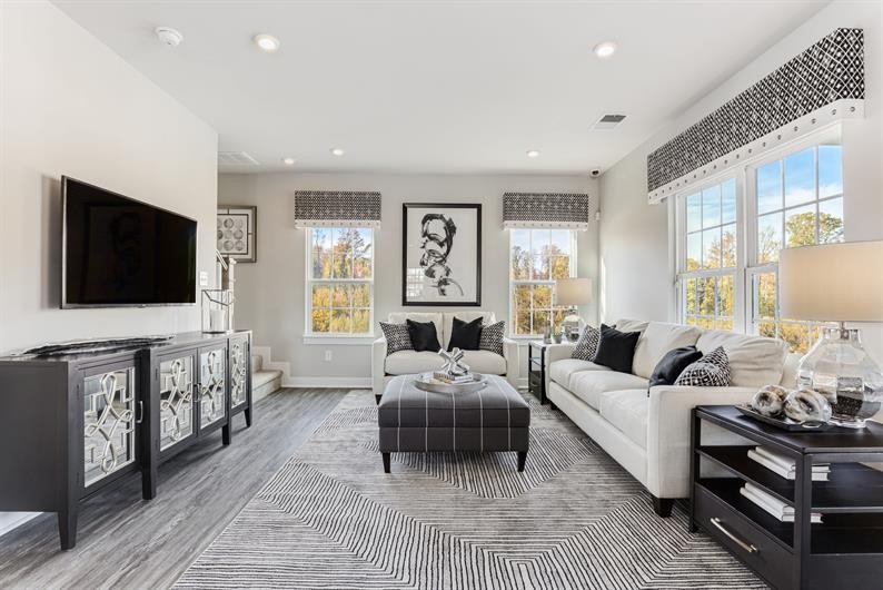 1030 Oglethorpe Drive Franklin, TN 37064 - Photo 4 of 17 a living room with furniture a flat screen tv and a large window