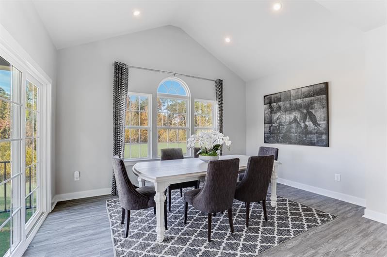 1030 Oglethorpe Drive Franklin, TN 37064 - Photo 7 of 17 a view of a dining room with furniture window and wooden floor