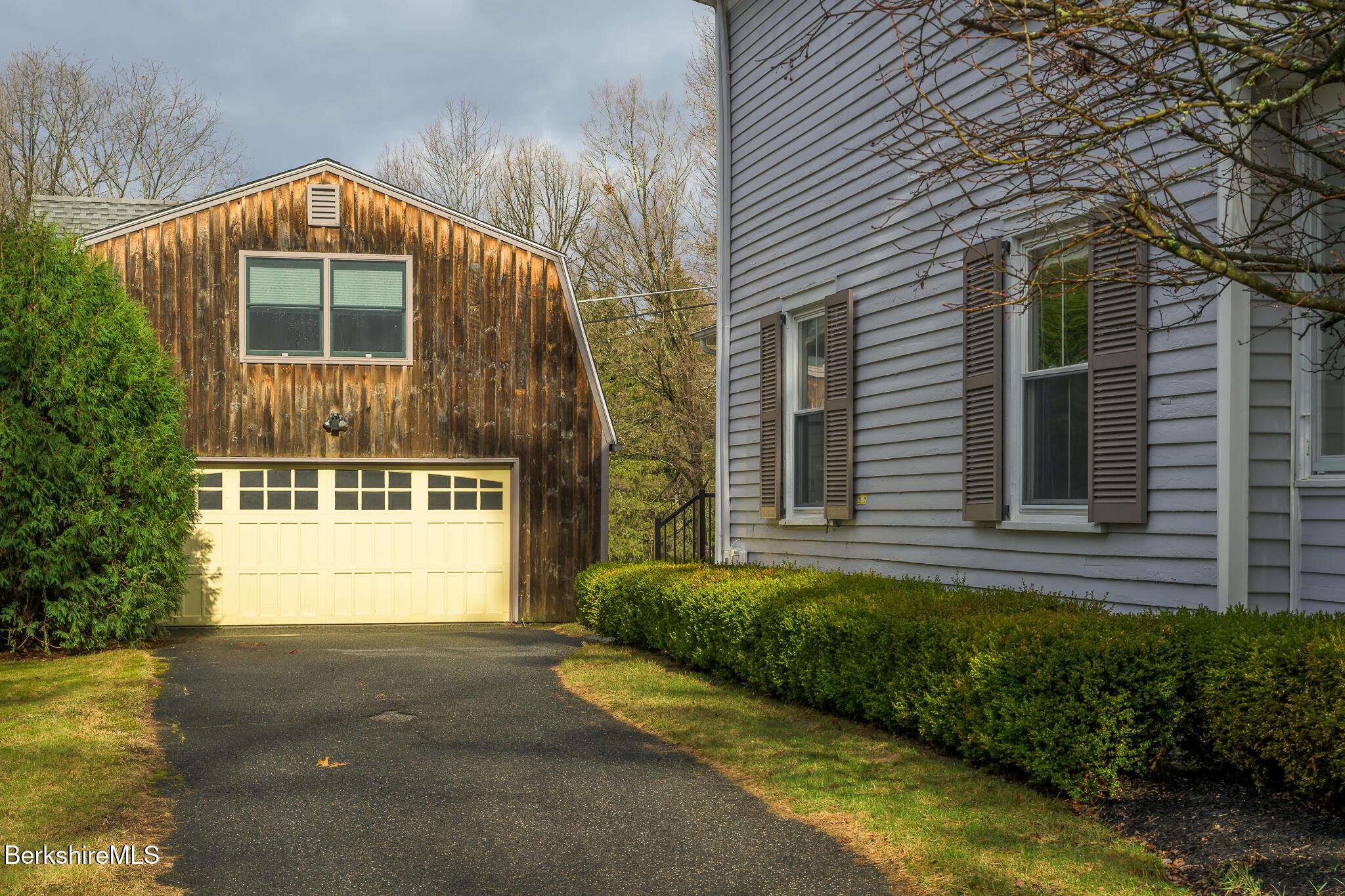 11 Sergeant Street Stockbridge, MA 01262 - Photo 3 of 52 a front view of a house with a yard