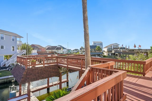 a view of a balcony with furniture