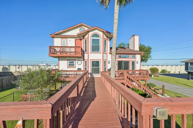 a view of a house with a swimming pool