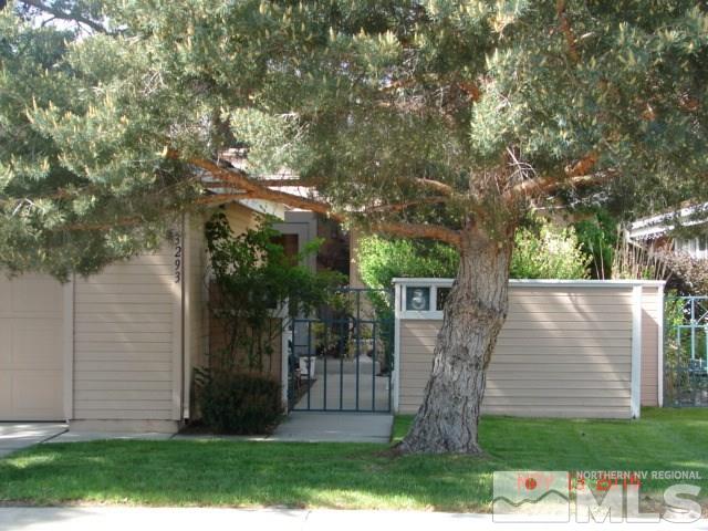 3293 Spring Creek Circle Reno, NV 89509 - Photo 1 of 1 front view of house with a yard