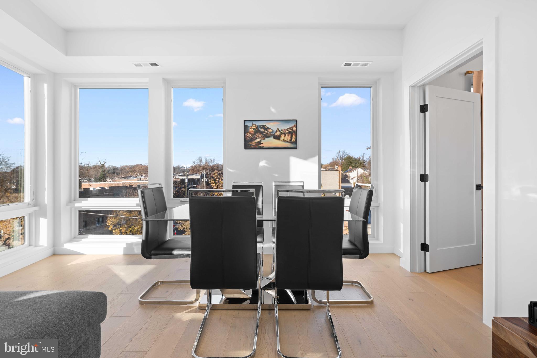 30 Kennedy Street Northwest, Unit 14 Washington, DC 20011 - Photo 20 of 40 a view of a dining room with furniture window and outside view
