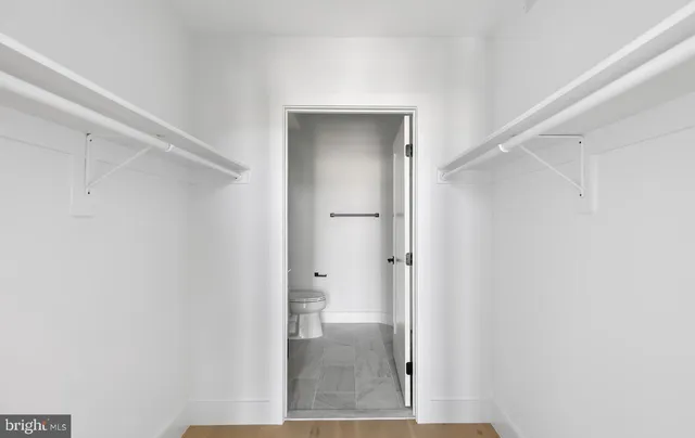a view of a bathroom with a glass door