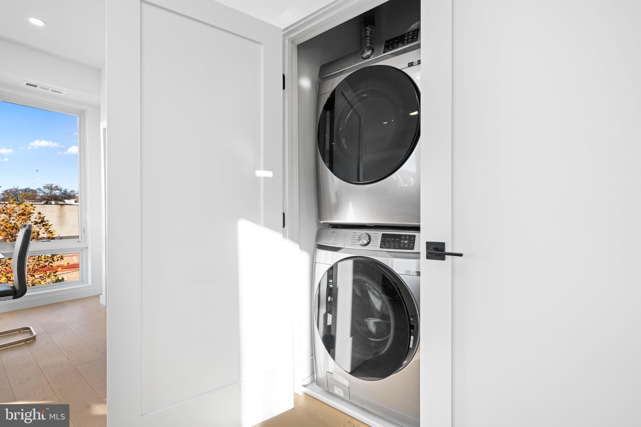 30 Kennedy Street Northwest, Unit 14 Washington, DC 20011 - Photo 35 of 40 a utility room with dryer and washer