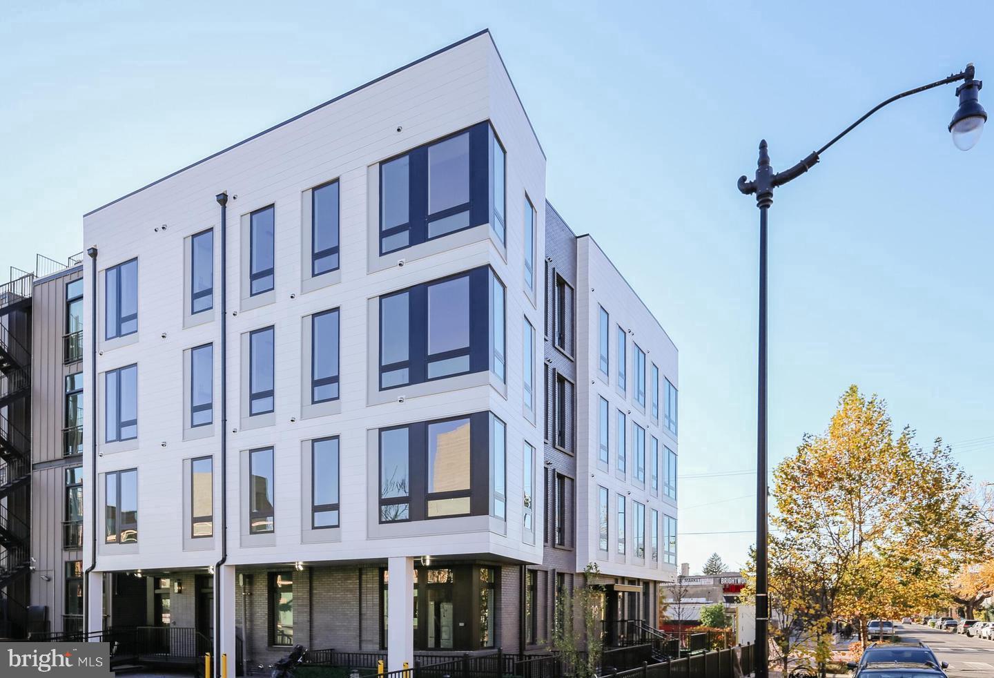 30 Kennedy Street Northwest, Unit 14 Washington, DC 20011 - Photo 36 of 40 a front view of a multi story building