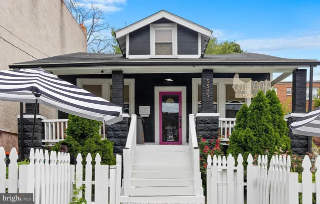 a front view of a house with a porch