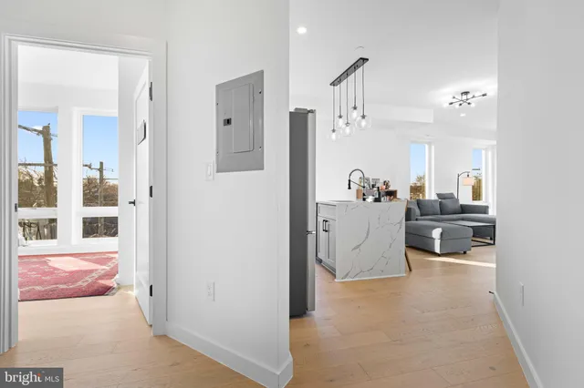 a view of living room and kitchen