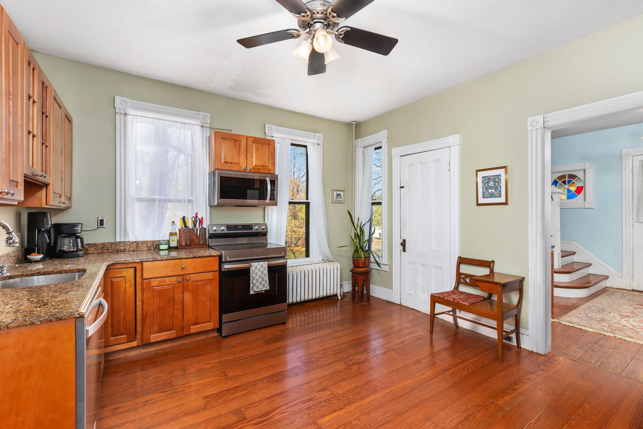 9 Mountainville Road Danbury, CT 06810 - Photo 11 of 36 a living room with stainless steel appliances granite countertop furniture and a kitchen view