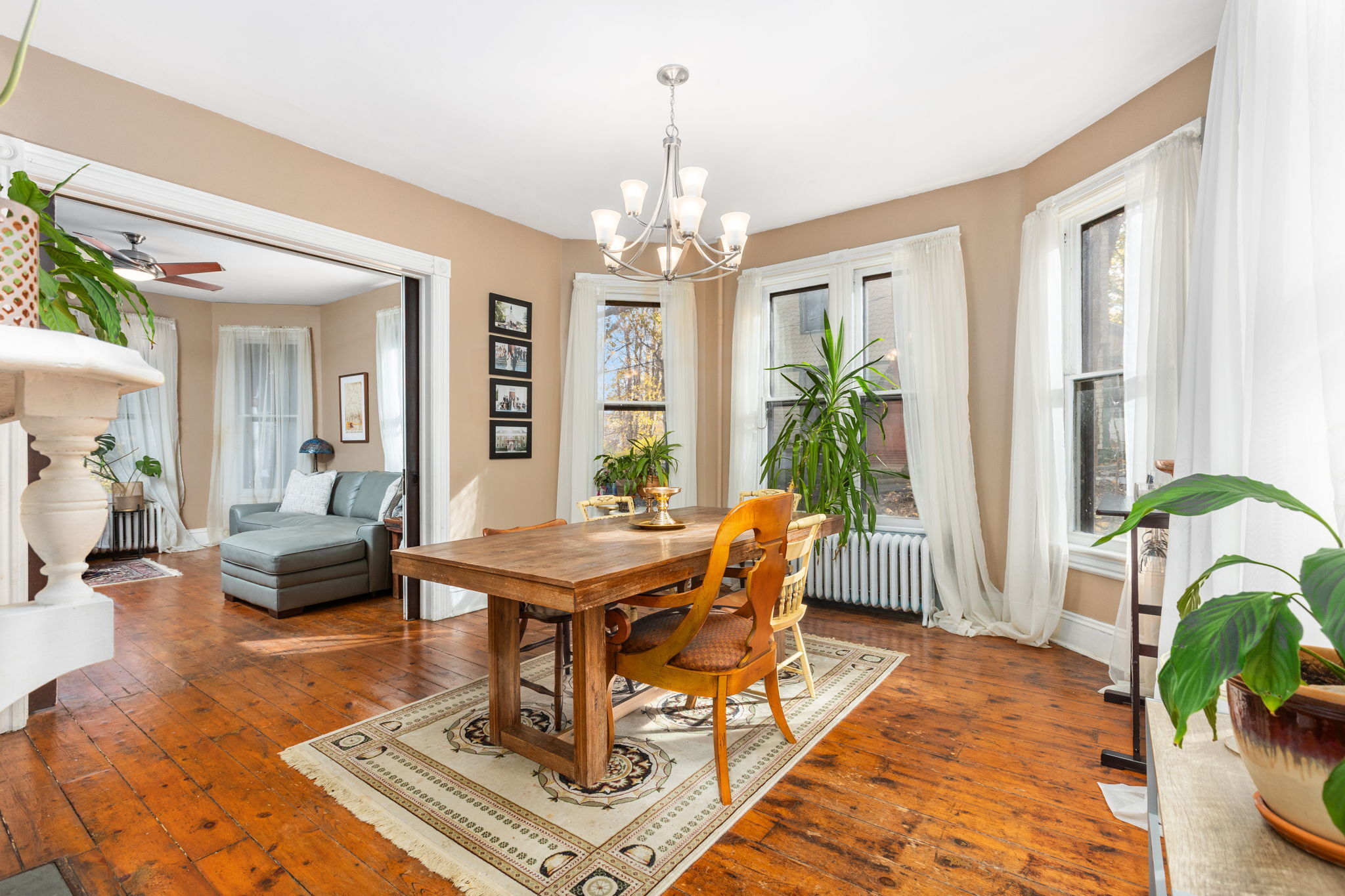 9 Mountainville Road Danbury, CT 06810 - Photo 9 of 36 a living room with furniture a chandelier and a rug