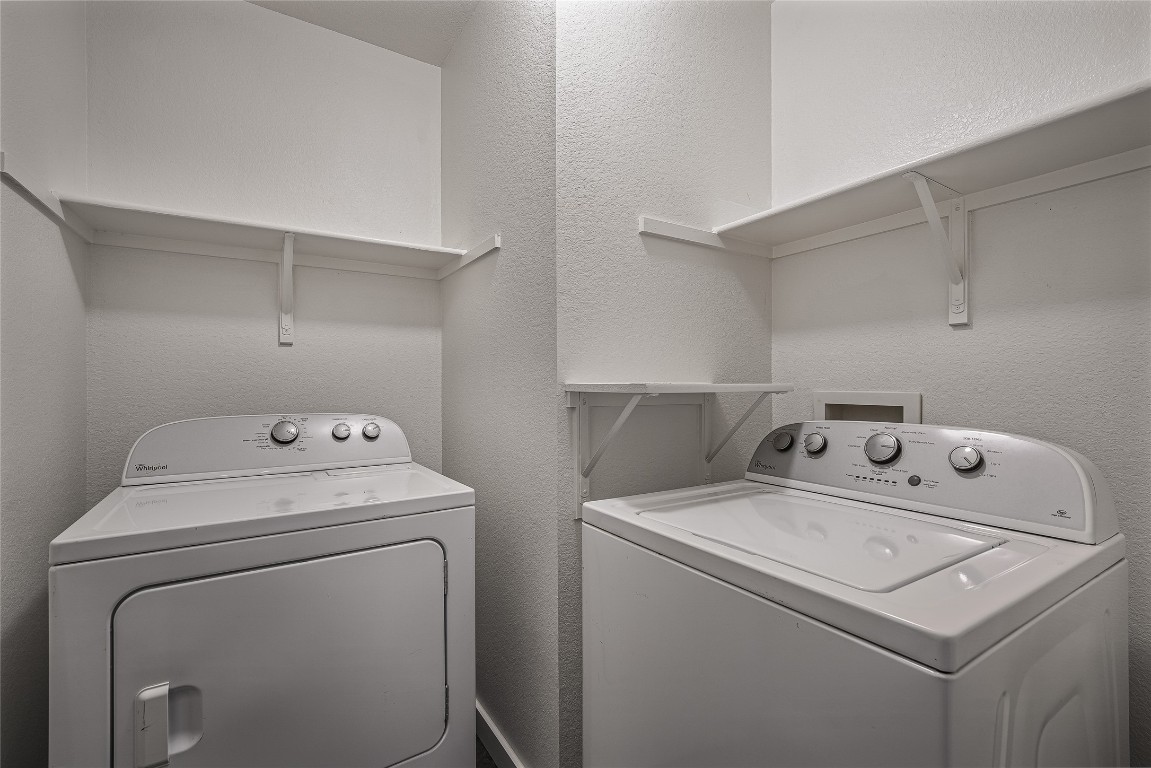 12517 Campana Drive Del Valle, TX 78617 - Photo 13 of 15 a utility room with dryer and washer