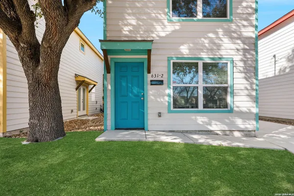 a view of a back yard of the house