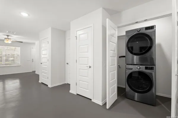 a kitchen with a refrigerator stove and microwave