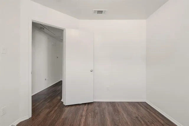 a view of small space with wooden floor