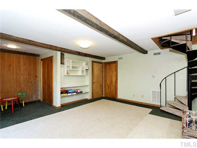 2013 Yorkgate Drive Raleigh, NC 27612 - Photo 18 of 25 Fully finished daylight basement has been used as a bedroom and a play room. There's a full bath, large closet and additional storage room. Private entrance.