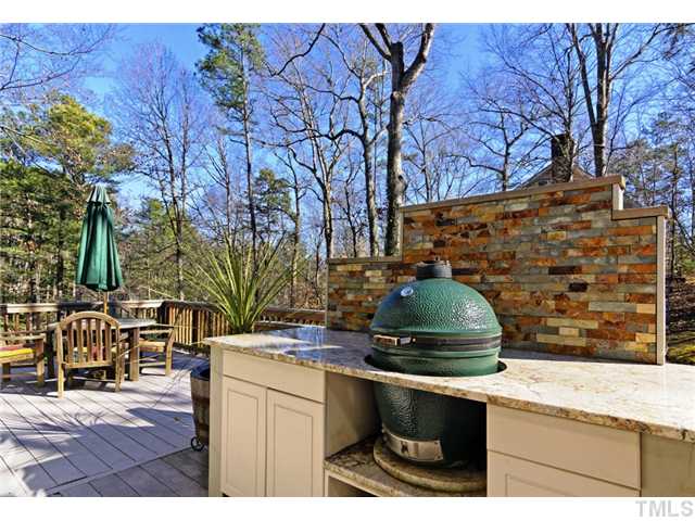 2013 Yorkgate Drive Raleigh, NC 27612 - Photo 10 of 25 Deck cooking station has granite counter top and stone wall backsplash. Cool egg grill is negotiable.