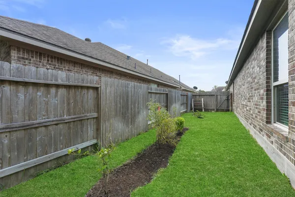 a backyard of a house with lots of green space