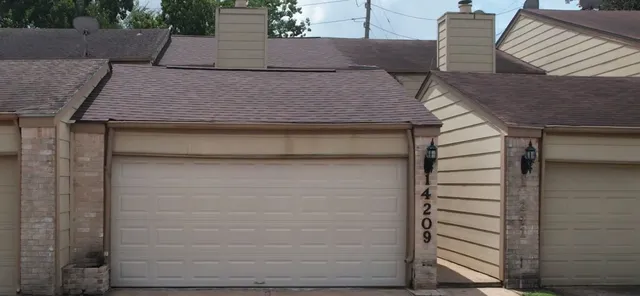 a view of entry way with wooden door