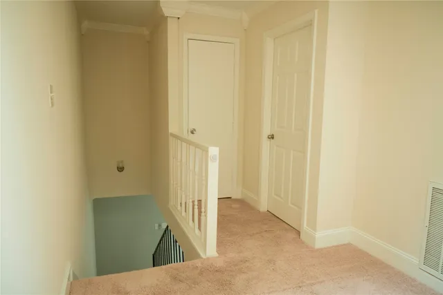 a bathroom with a toilet and a sink