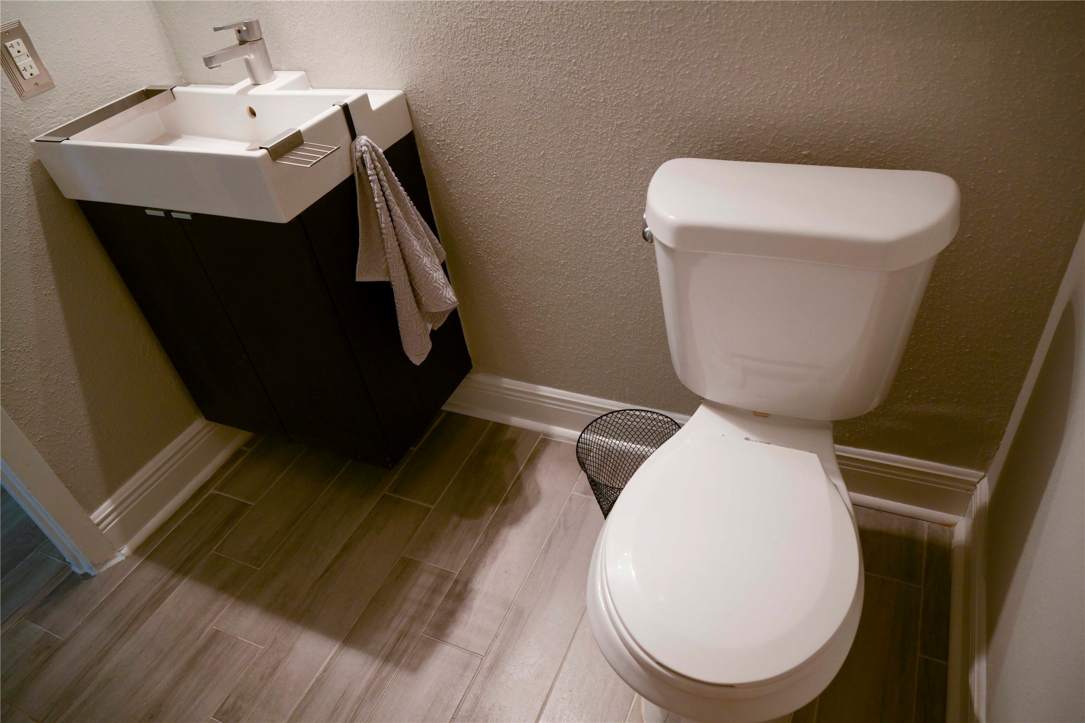 14209 Briarsage Court, Unit TH15 Houston, TX 77077 - Photo 19 of 31 a bathroom with a toilet and a sink