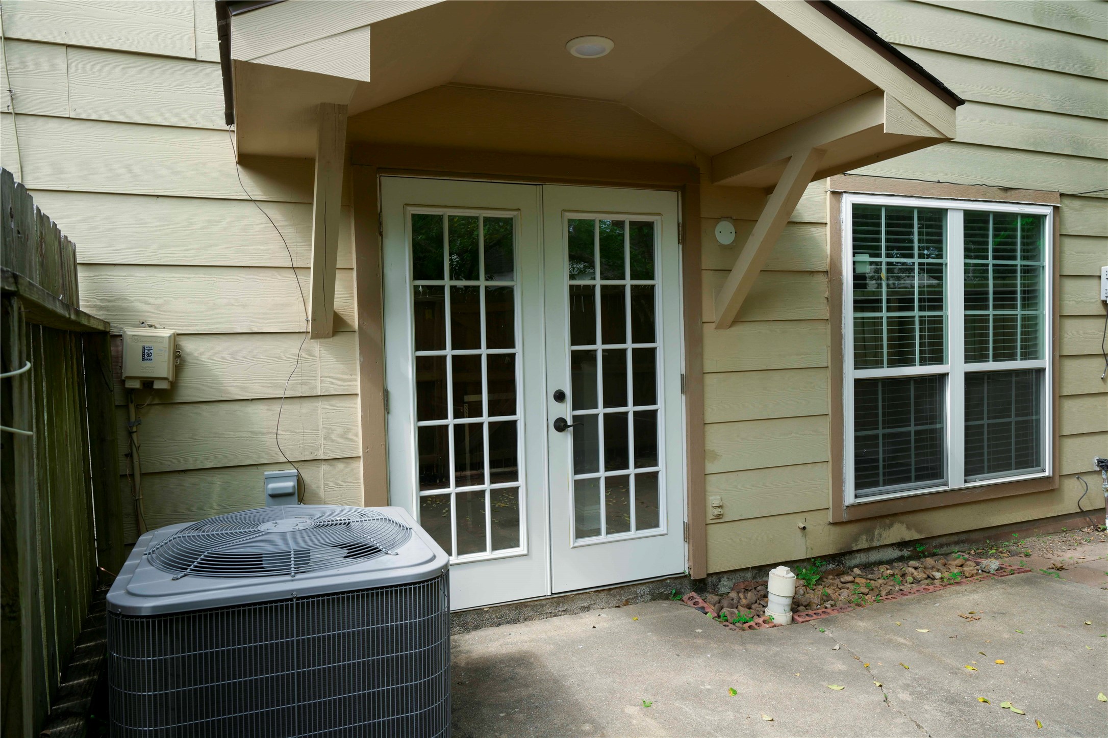 14209 Briarsage Court, Unit TH15 Houston, TX 77077 - Photo 28 of 31 a front view of a house with a window