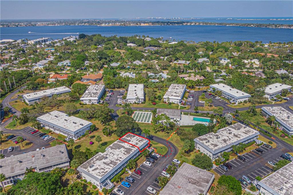 2929 Southeast Ocean Boulevard, Unit 1436 Stuart, FL 34996 - Photo 17 of 18 an aerial view of a city with lots of residential buildings