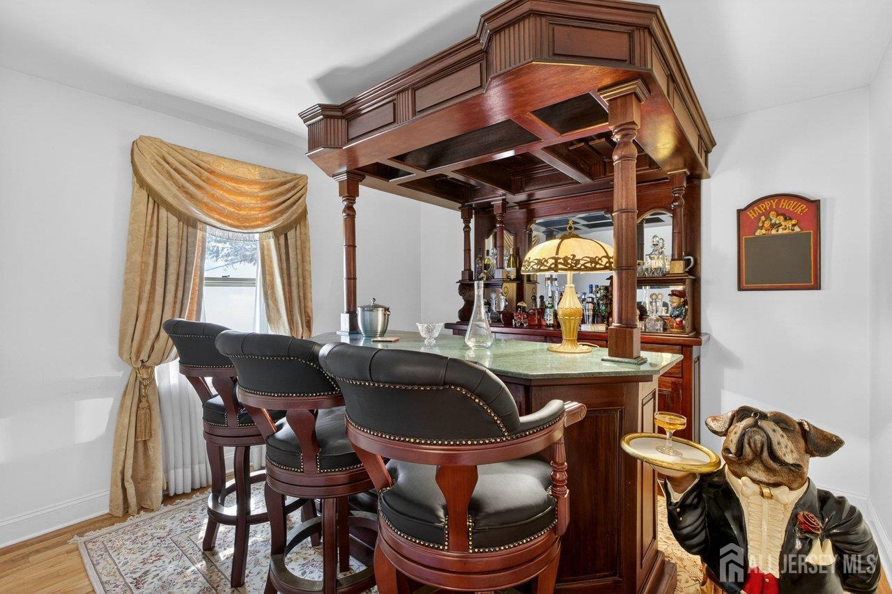 15 Cherokee Road East Brunswick, NJ 08816 - Photo 18 of 45 a view of a dining room with furniture and chandelier
