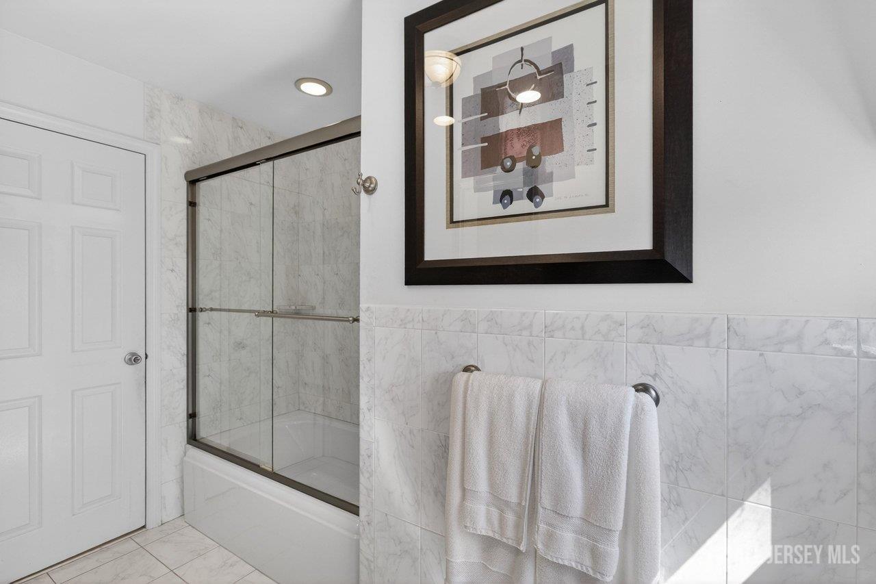 15 Cherokee Road East Brunswick, NJ 08816 - Photo 22 of 45 a bathroom with a shower and a sink