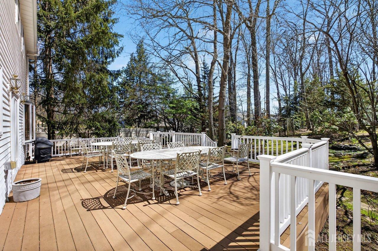 15 Cherokee Road East Brunswick, NJ 08816 - Photo 37 of 45 a view of balcony with wooden floor and outdoor seating