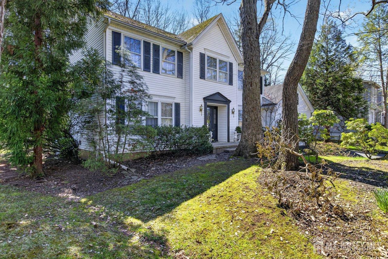 15 Cherokee Road East Brunswick, NJ 08816 - Photo 4 of 45 a front view of a house with a garden