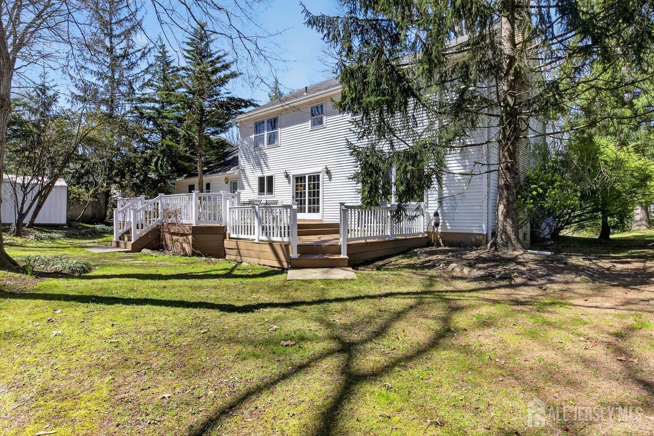15 Cherokee Road East Brunswick, NJ 08816 - Photo 45 of 45 a view of a house with swimming pool and sitting area