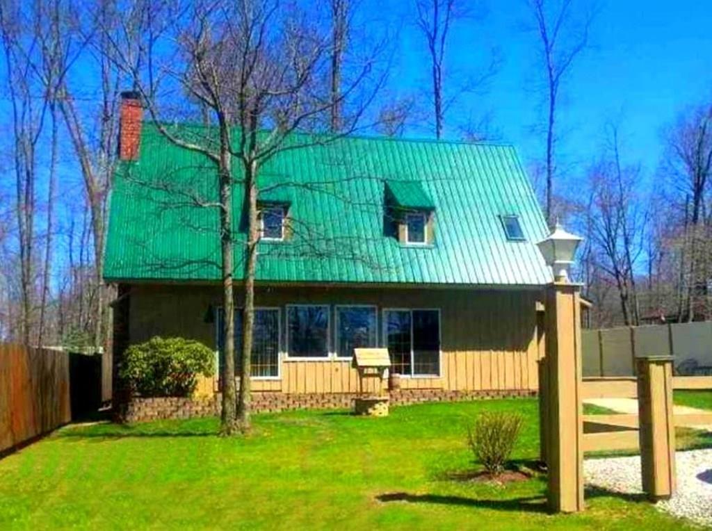 2392 McArthur Road Jamestown, PA 16134 - Photo 1 of 16 T111 exterior and new metal roof, well and public sewer