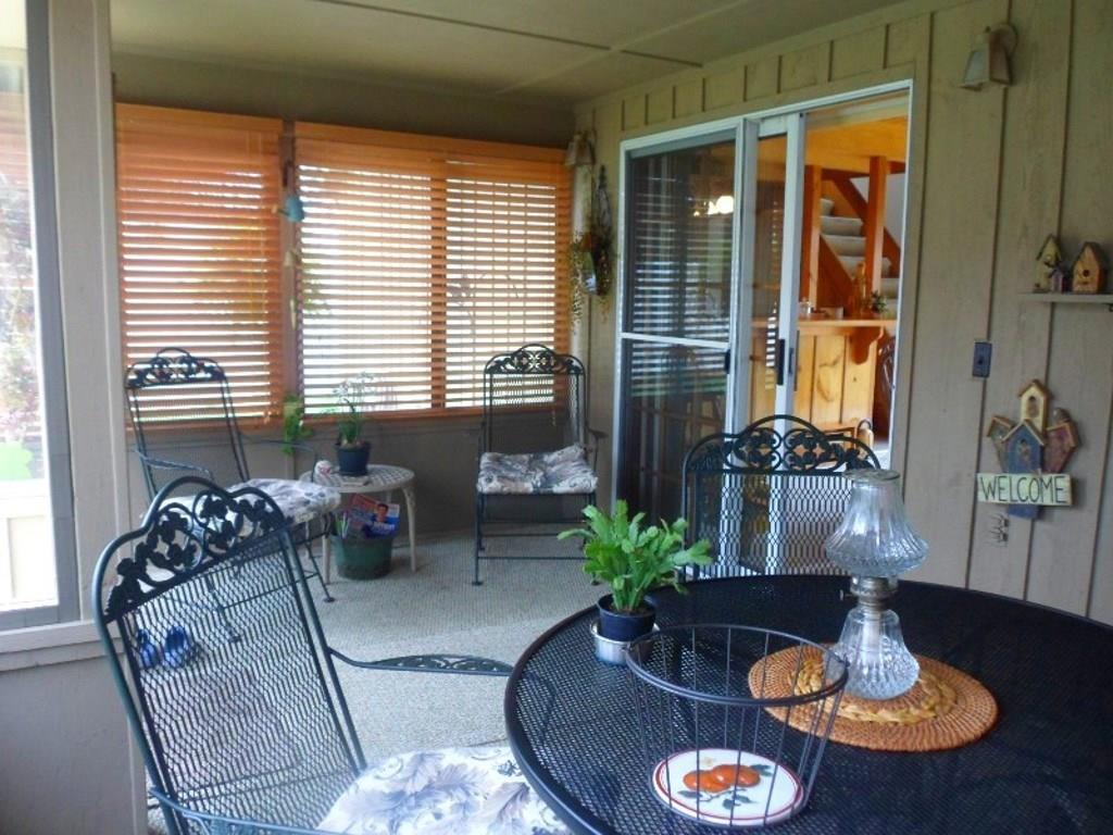 2392 McArthur Road Jamestown, PA 16134 - Photo 11 of 16 3 season room off dining room and living room
