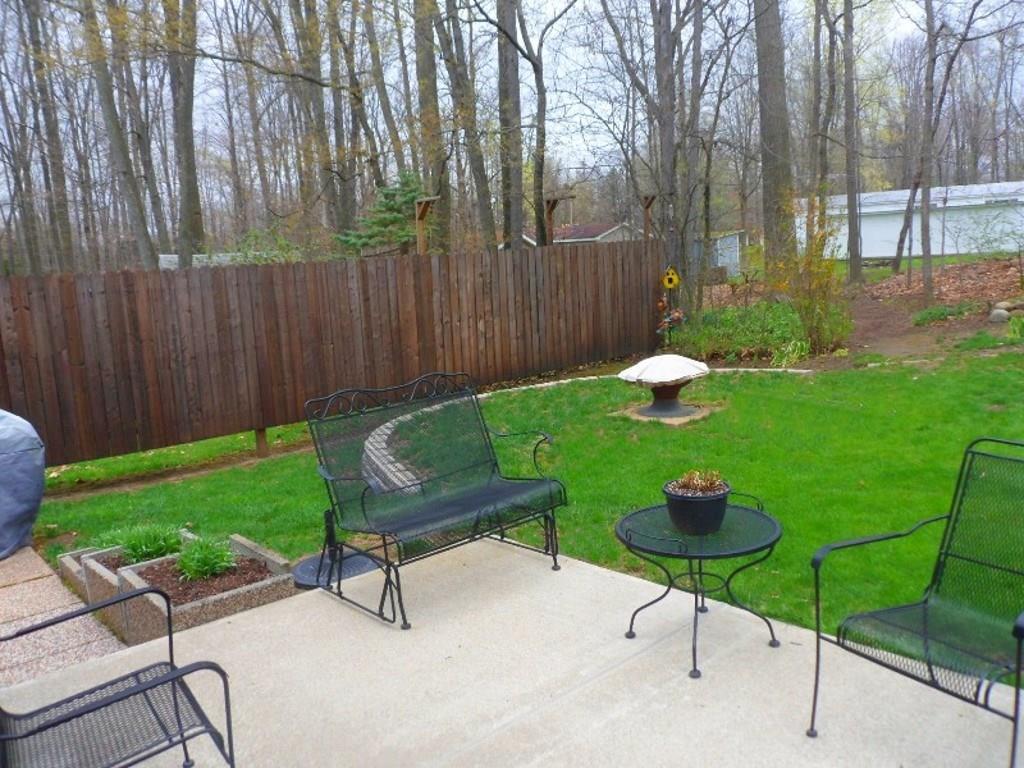2392 McArthur Road Jamestown, PA 16134 - Photo 13 of 16 Back patio and raised flower beds