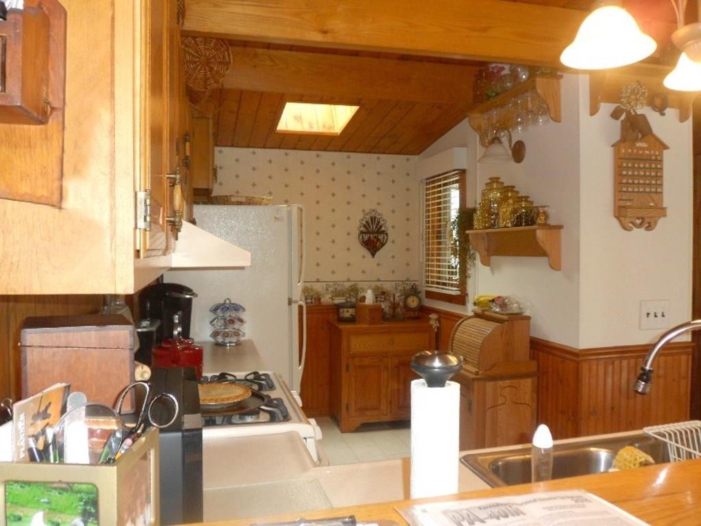 2392 McArthur Road Jamestown, PA 16134 - Photo 5 of 16 Kitchen skylight and window looking out to front yard