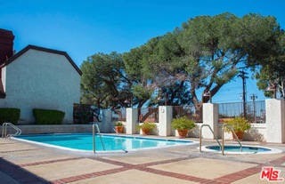 230 Bethany Road, Unit 125 Burbank, CA 91504 - Photo 3 of 3 a front view of a house with garden