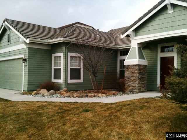 9570 Oakley Lane Reno, NV 89521 - Photo 1 of 5 a front view of a house
