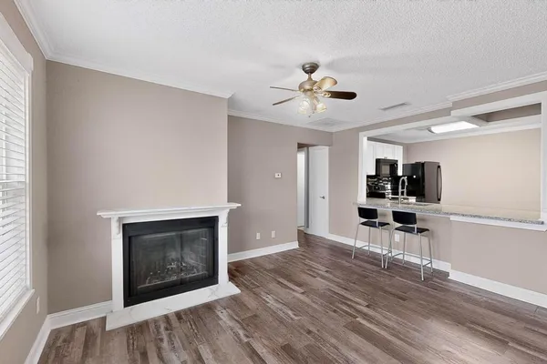 a kitchen with a stove and a microwave