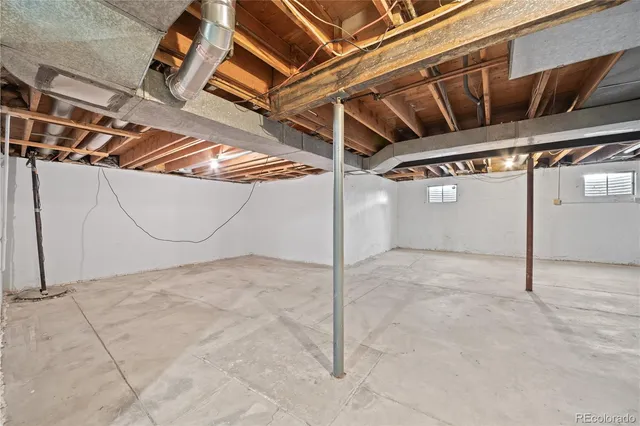 a view of roof deck with seating space and yard