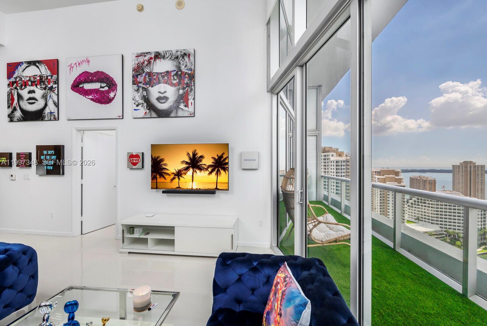 475 Brickell Avenue, Unit 2811 Miami, FL 33131 - Photo 10 of 14 a view of a living room and a window