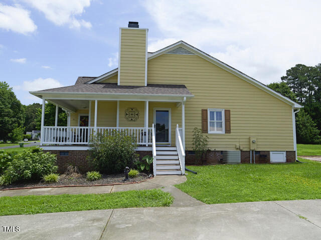 2817 Buckboard Lane Raleigh, NC 27603 - Photo 4 of 31 a front view of house with yard and green space