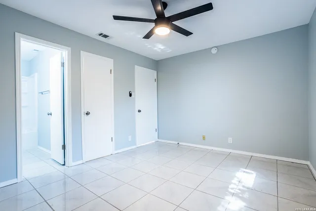 a view of an empty room and window