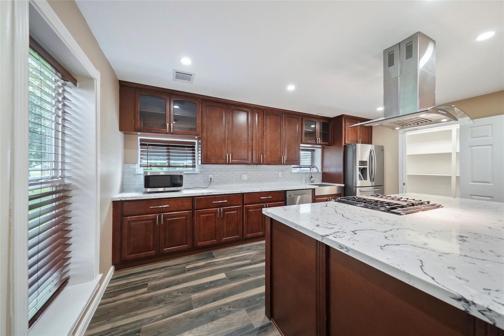 30720 Waller Spring Creek Road Waller, TX 77484 - Photo 5 of 22 Updated island kitchen featuring abundant cabinetry and generous counter space!