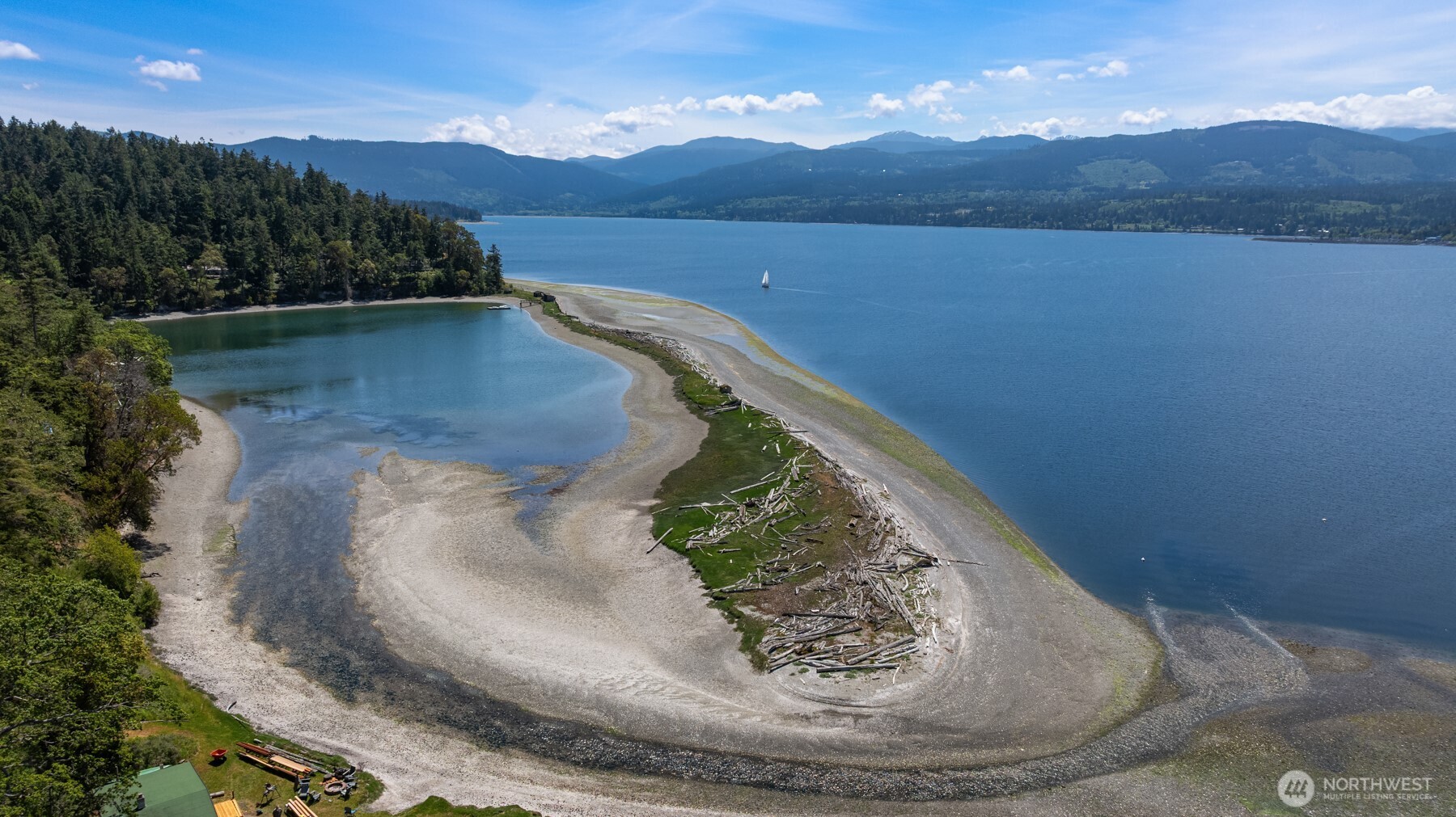 4065 East Sequim Bay Road, Unit 12 Sequim, WA 98382 - Photo 33 of 40 a view of a wooden floor in a lake