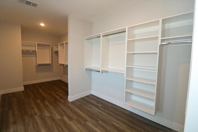 8653 Ivanhoe Drive Melbourne, FL 32940 - Photo 18 of 24 a view of an empty walk in closet
