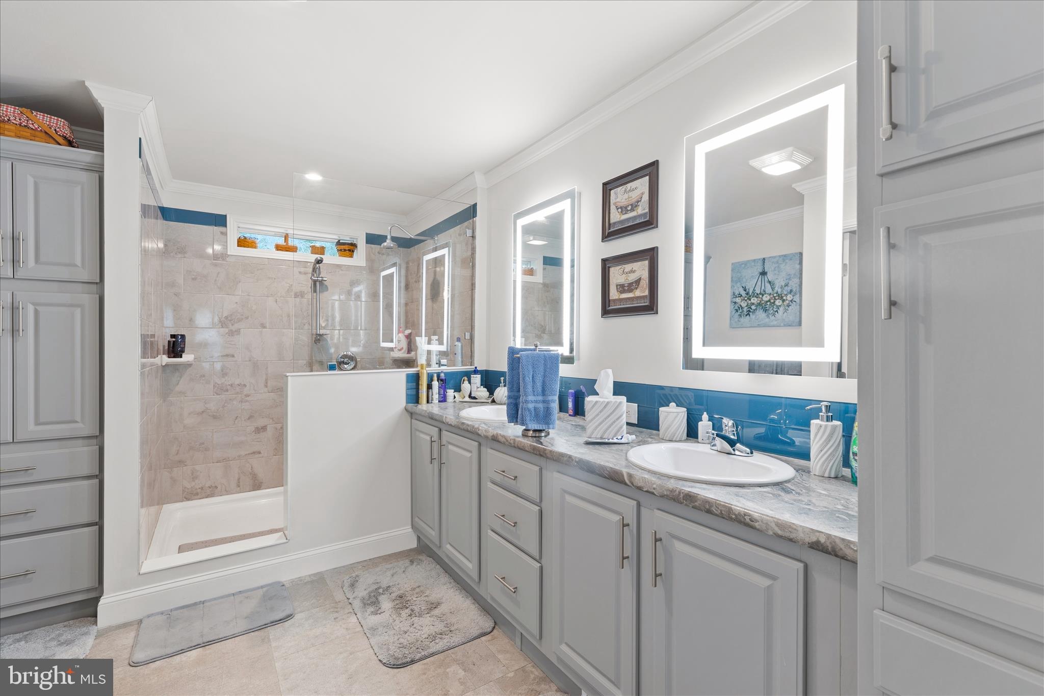 21933 Conrail Road Seaford, DE 19973 - Photo 29 of 35 a bathroom with a granite countertop sink mirror and double