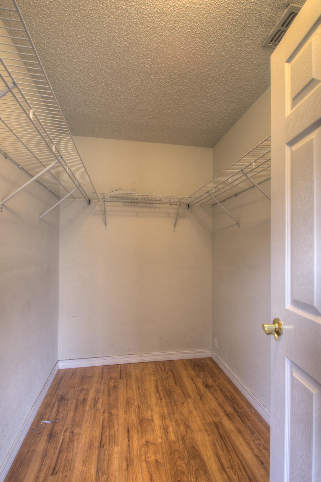 219 Limestone Circle Crestview, FL 32539 - Photo 18 of 31 a view of a room with wooden floor