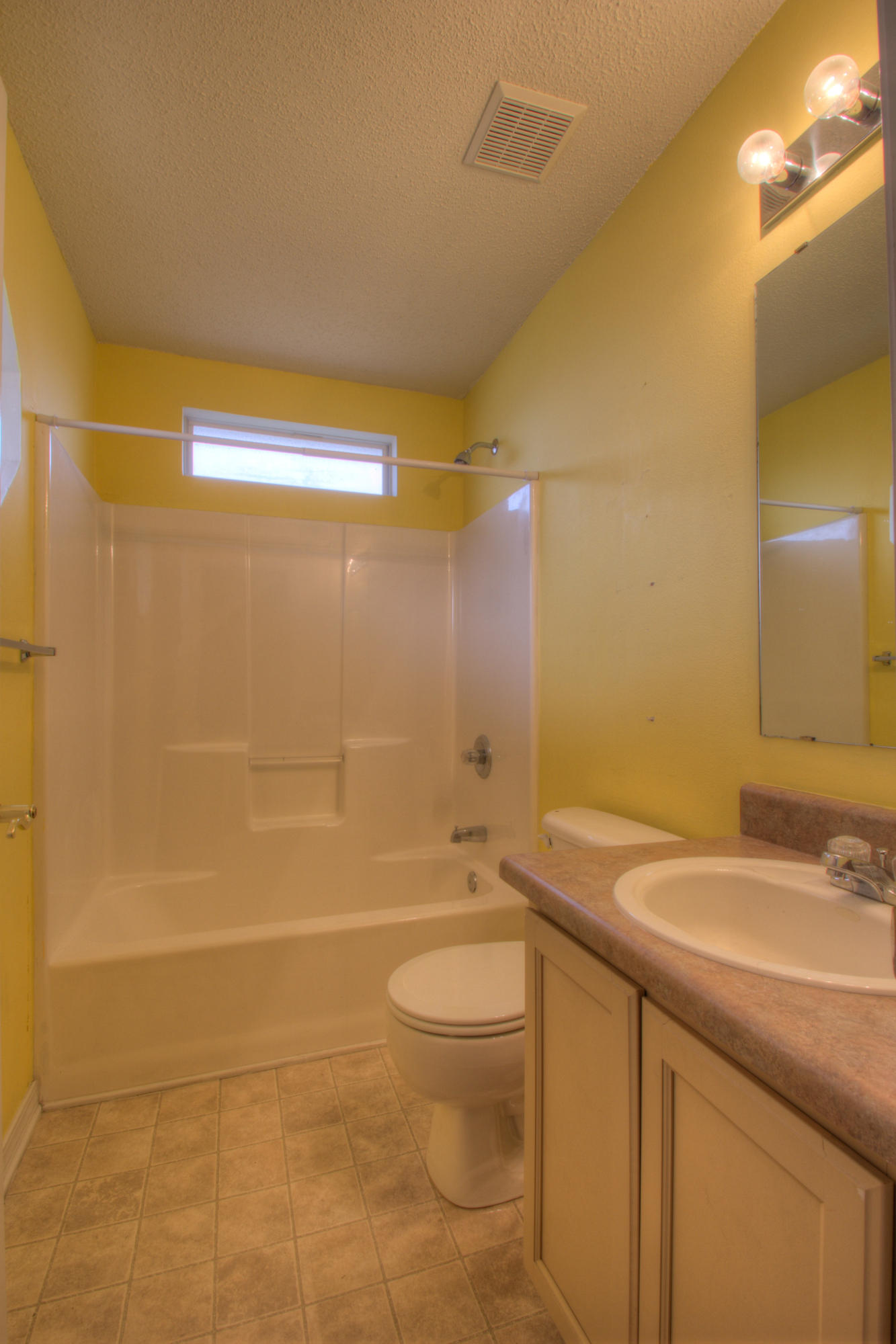 219 Limestone Circle Crestview, FL 32539 - Photo 23 of 31 a bathroom with a sink a toilet and shower