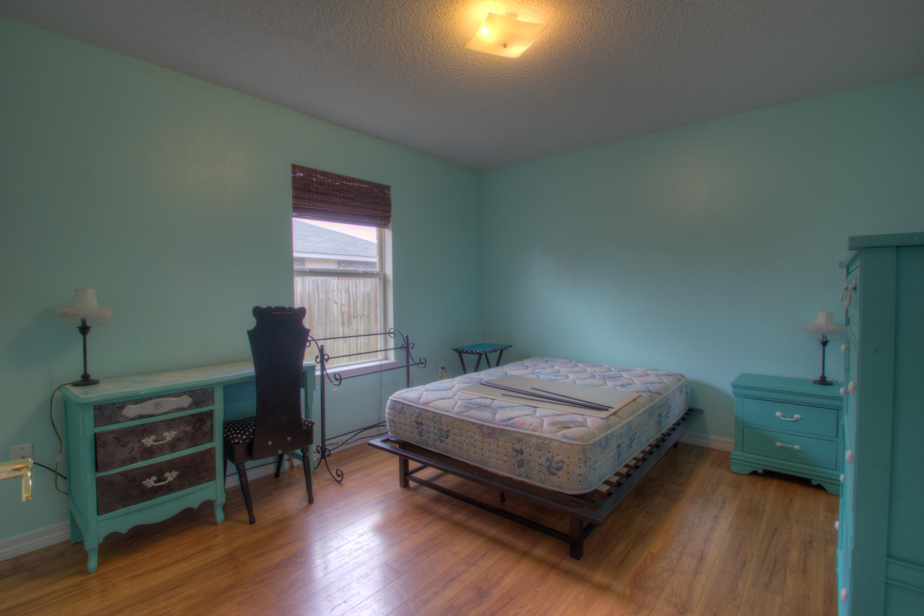 219 Limestone Circle Crestview, FL 32539 - Photo 24 of 31 a bedroom with a bed and a desk in it