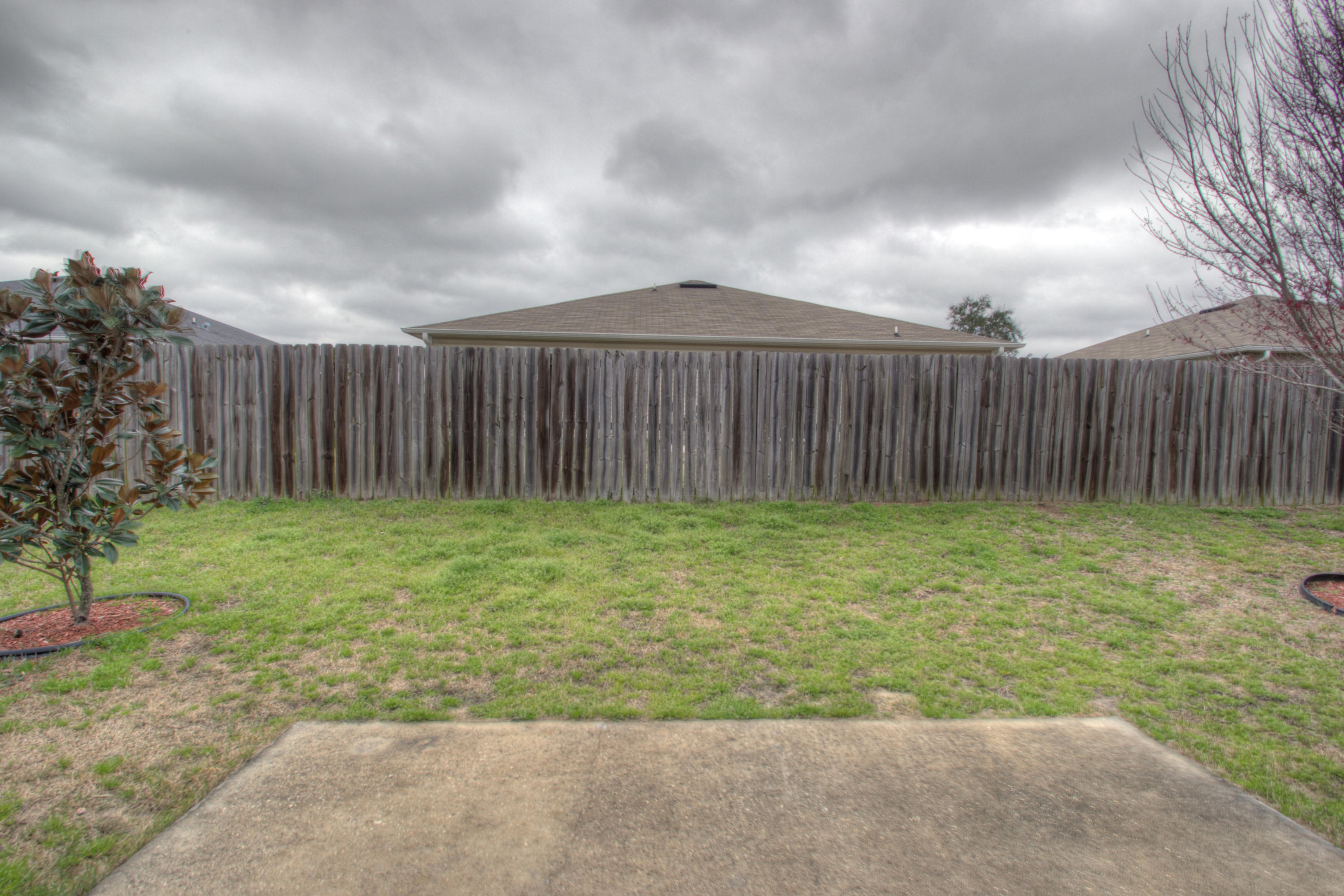 219 Limestone Circle Crestview, FL 32539 - Photo 26 of 31 a view of a backyard